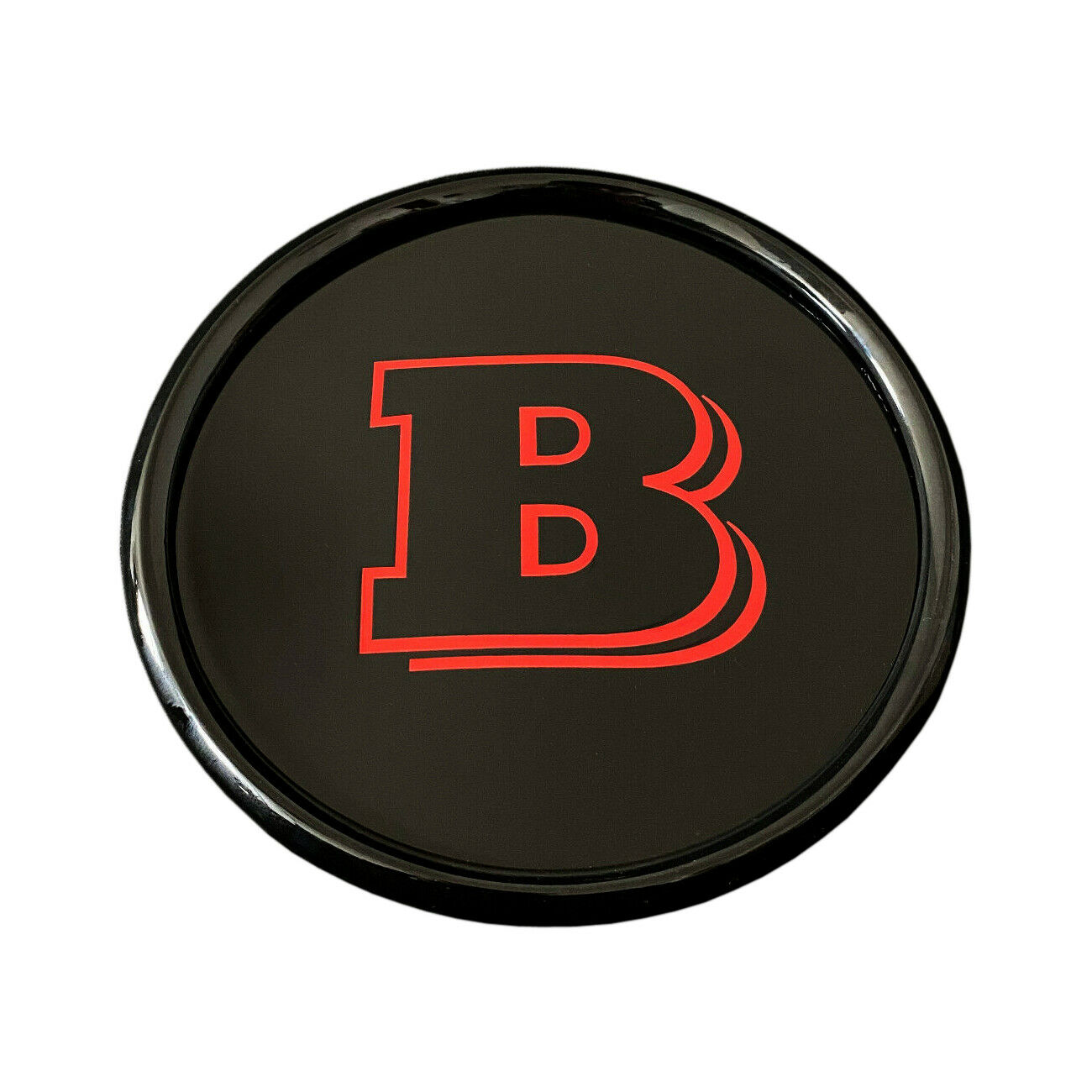 Emblemat grilla plastikowy Mercedes-Benz W465 2024- G-klasa styl Brabus red